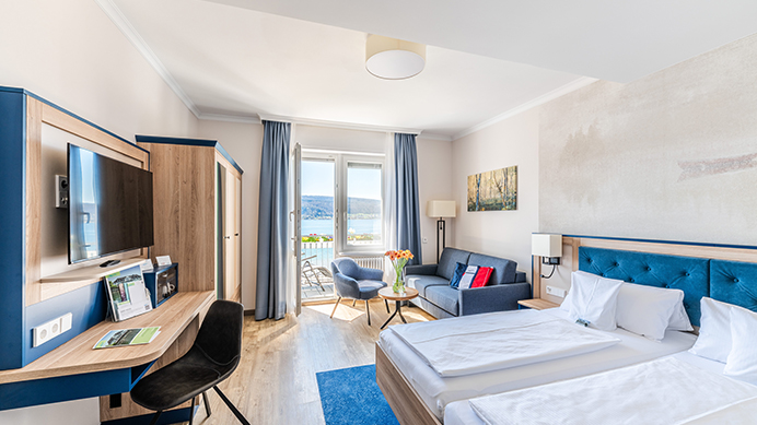 https://loechnerhaus.de/wp-content/uploads/2021/03/Loechnerhaus_Hotel_692x389_DZ_SB_B_N-3.jpg