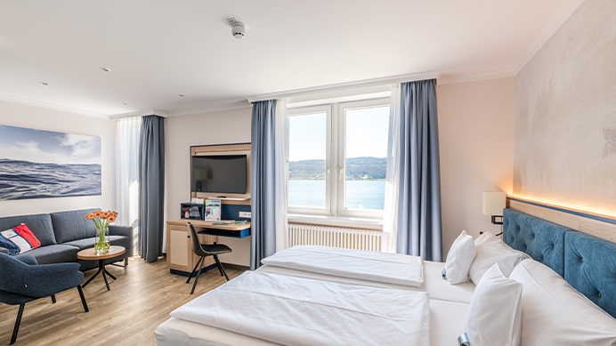 https://loechnerhaus.de/wp-content/uploads/2021/03/Loechnerhaus_Hotel_692x389_DZ_SB_S_N.jpg
